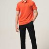 Topkleding Halfmoon | Gebreide Oranje Polo